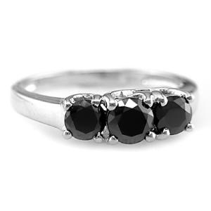 wedding ring - Bought on Overstock Auctions, this ring is valued at over $3,000, but with shipping and all, we only paid $190. Great deal, awesome ring. Most men wouldn't let a woman just go buy their own wedding ring, but my man let me pick the ring I wanted. It isn't about the price we paid for it. It is a truly wonderful ring. The ring is white gold with 3 black diamonds weighing in at 1.25 carats