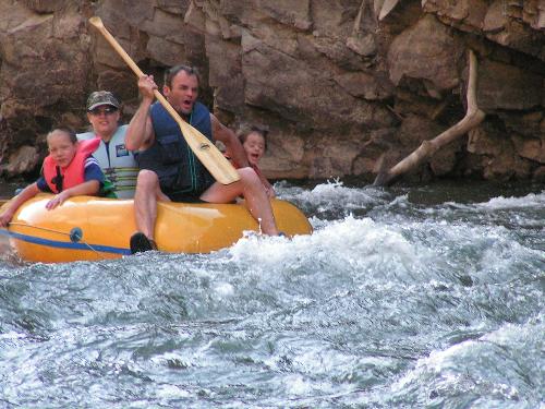Rafting on the Salmon River - This is from a family camping trip at Deer Gulch in Idaho. We all decided to cool off in the afternoon and went on a little rafting trip. We had 2 adults and 4 kids in the raft. Boy you never realize how scared kids are of water until you take them rafting. In the end, everyone had a great time.