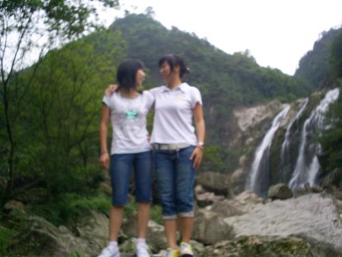twins - This is a picture of my sister and I.We are twins.We stand on mountains and laugh.We are happy.How time flies.