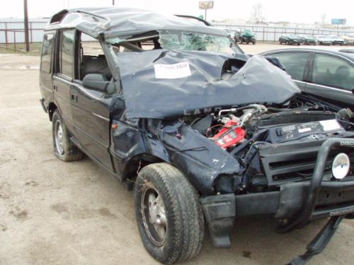 Car Wreck - This is a photo of a rolled over Land Rover.