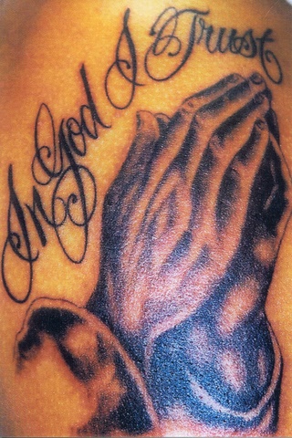 praying hands tattoo - tattoo of praying hands on shoulder