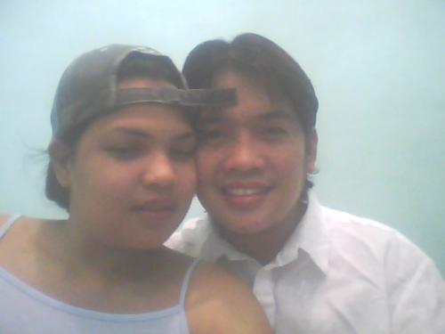 me and my beloved wife - it was taken inside our house during bed time