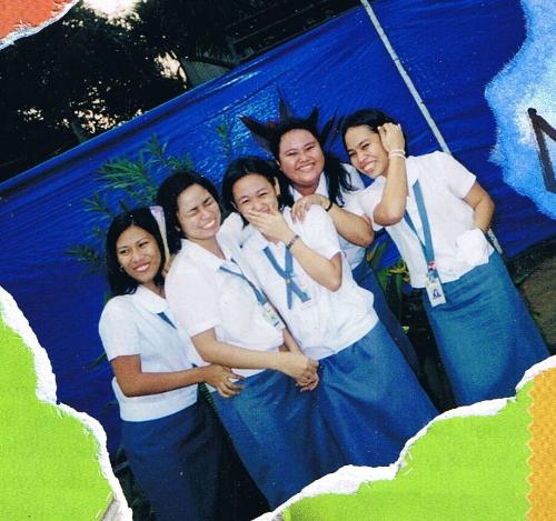 my friends - This photo was taken at our school, way back 2003 when i was only third year college. We've asked someone to shoot this for us using my disposable camera that's free from my new prepaid phone kit. The funny thing about our picture is that the person who took this doesn't know how to use the camera so i have to cut it out just to have it become decent one.
