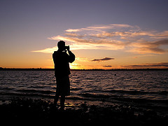 photographing some scenery - This is a man photographing nature