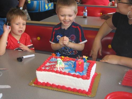My son - This is my four year old at his birthday party at Chuck E Cheese, he was so excited when everyone sang him Happy Bday!