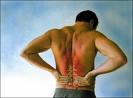 Back Pain - A person who is having back pain.