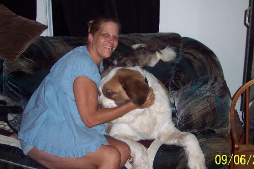 Me and my dog Danny boy - This is my St.Bernard Danny boy. and me, hanging out on the couch his first time sitting there it was cute.