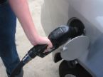 I don't have to buy gas! Thank God! - pumping gas