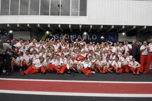 winner - picture of ferrari team took at interlagos, after Kim won the title of 2007 driver's championshit