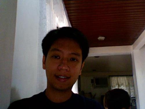 me at my ate's mac - i look like moreno here, right? using the cam at a mac laptop makes you look good. hehehe. true. ahahaha