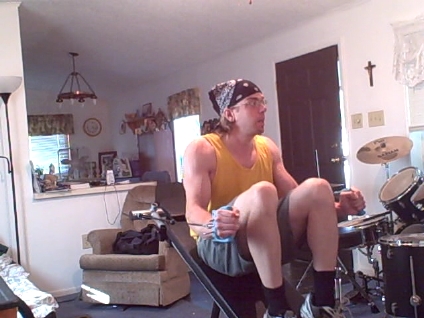 using my 'body former' exercise machine. -  I'm into working out quite a bit.I also enjoy playing drums and listening to alot of new age music.Of course i still dig metal and alternative rock but my tastes in the tunes has expanded quite a bit.Alot of versatility as far as my interests in music goes.I'm quite a bit into jazz,folk and blues as well.Right now as i type this out i have new age style tunes playing in the background.I have sirius satellite radio and it's REALLY good to have.I REALLY enjoy the spa station.That's the one that plays all the beautifull and soothing new age stuff.  I have a pretty cool mountain bike.It's a green 'diamondback response'. I ride it quite a bit.I should get an ipod though,so i can listen to new age and jazz tunes while i ride.I think those two styles of music go best to bicycling.