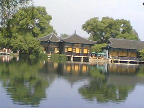 West Lake in Hangzhou China - It is a beautiful place and i believe everyone who has ever been there will agree that it is a paradise coz it looks just like a picture.
