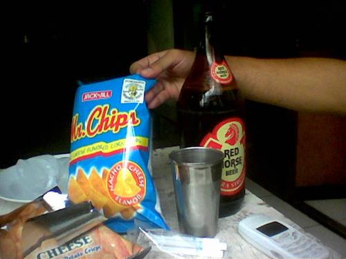junkfood and beer - This is what we usually have when my friends and i hang out in some place. i know they're kinda unhealthy, but we have fun munching on junk foods and quenching our thirst through beer.