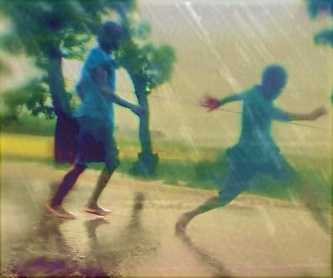 playing in the rain - As a kid that was one of my favorite things. I still love it now :)