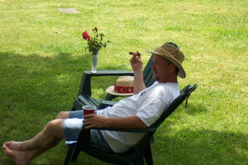 My husband chilling in the front yard on a Sunday. - My husband chilling in the front yard on a Sunday.