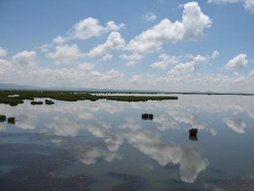 beautiful lake - local people there call it huahai('the flower lake'), they said in spring the lake water may rise and flood the meadow, and there will be wild flowers everywhere make it a wonder land...