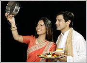 karwa chauth - Couples celebrating karwa chauth