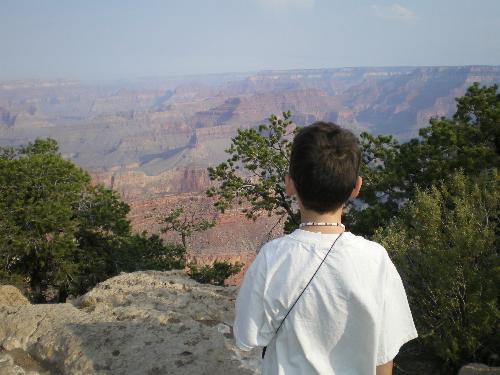 This is my son looking at the Grand Canyon for the - My son didn't know what he was even going to see, and when we finally walked to where we could see the canyon, he was shocked that there was any place like this on earth.