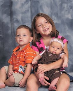 My kids - These are my three precious children. It was very hard to get them to all sit there at the same time.