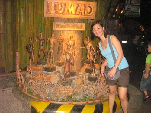 photo with the lumads - Taken at Jack's Ridge, I took the opportunity to have my picture taken beside their display, the Lumads. The Lumads are the early people of Mindanao.