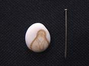Virgin mary pebble - Photo taken from Trade Me, a New Zealand Auction site.