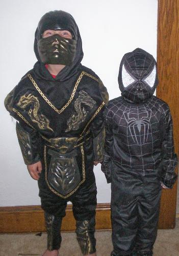 My Boys wish You a Happy Haloween! - These are my boys. They are a Black Ninja and Black spidernam. Arnt they cute?!