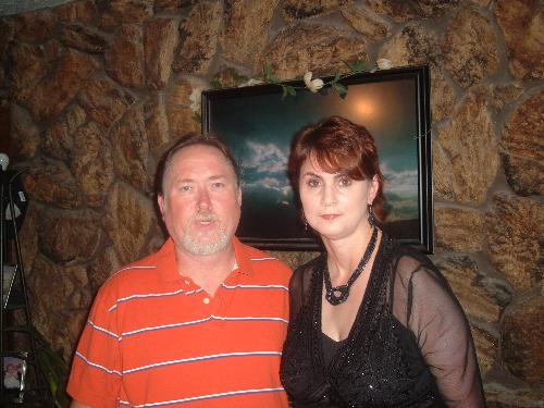 My Husband and I - This was taken right before my husband's 30 year high school reunion this past summer. WHAT A BLAST!! I didnt even go to that school and I LOVED IT!