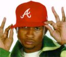 Usher - Looking hot in a red cap.