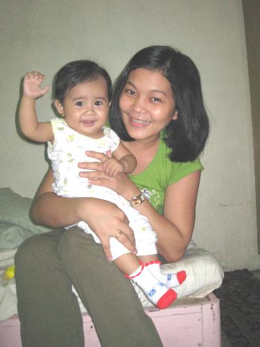me and my daughter - This picture was taken by my husband at the time when I arrived home from office. It was already evening and we've gotta have our time still together, also, I've seen them both with a happy face that surely can melt all my worries and tiredness from almost whole-day working! It's terrific!~
