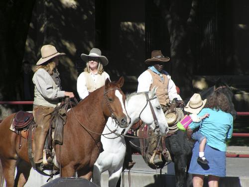 Ready to herd - These cowboys (and girls) were getting ready to herd the longhorn steers though the Ft Worth (Texas) stockyards. They do this every afternoon for the tourists. Guess you can still be a cowboy/girl in the 21st century! 