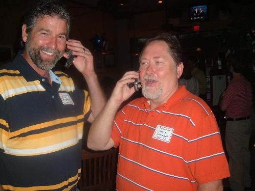 Talktalktalk - Louie and his friend at his reunion....goofing around on the cell phones...