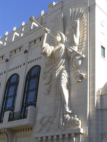 Angel on a bulding. -  This angel is sculpted on a building in Ft. Worth, Texas. It is huge. (The building is three stories high.) I thought it was so beautiful, I took several pictures of it with my digital camera.