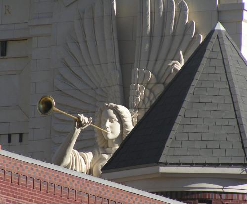 Angel Blowing His Horn - I have posted another picture of this angel in another discussion. It is sculpted on the side of a large building in Ft. Worth, Texas. I liked the way the two buildings framed the angel's face in this picture. 