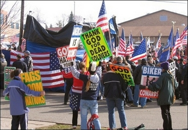 Members of Westboro Baptist Church picketing  - photo from Yahoo! news