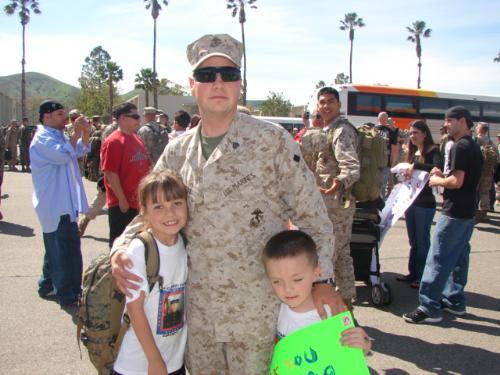 Husband with my two kids  - Husband with my two kids the day he came home from Iraq