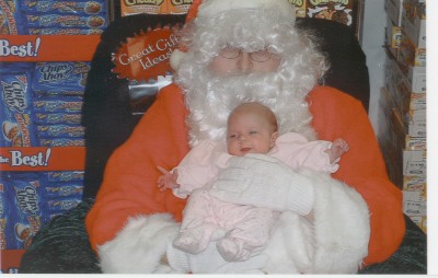 baby and santa - this is my daughter 2 months after she was born