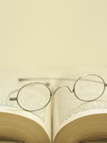 Book with glasses - Its a book with glasses in it. 