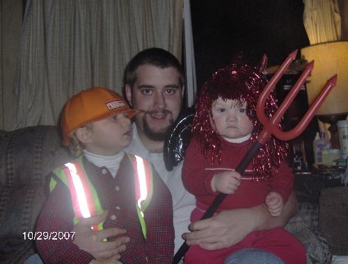 My son with my two grandsons in their halloween co - My son with my two grandsons in their halloween costumes