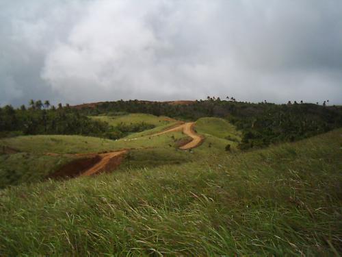 on top of a hill - This is shot on top of a hill in Rapu_rapu Island, Abay, Philippines. The lush green landscape of the island beckons any discerning visitor. It will enchant and captivate a weary soul of a wanderer like me.