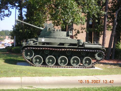 army tank - This is one of those old tanks the soldiers used to sue in war. Today, I think they're similar but built completely different.