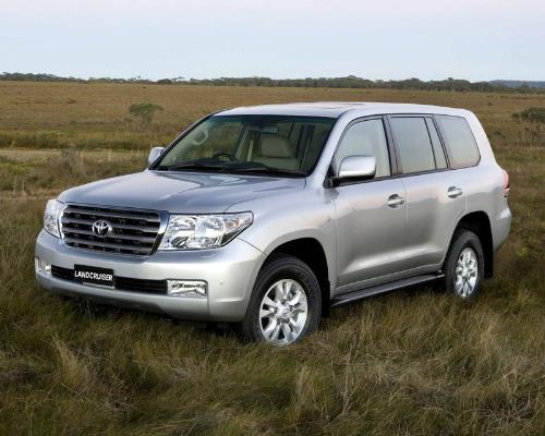 The All-New 2008 Toyota Land Cruiser - The King Of - High-Strength Chassis and Suspension :  high-strength, high-rigidity frame structure that uses lightweight, high-strength steel and deeper,wider frame longitudinals help to provide enhanced safety.It receives a new double-wishbone independent front suspension and four-link rear suspension with a solid live axle. The brake system is enlarged and more powerful than ever, with 13.4-inch ventilated discs and four-piston calipers up front and 13.6-inch ventilated discs at the rear. steel -belted radial tires mounted on 18 x 8.0-inch aluminum alloy wheels  Engine, Transmission and Drivetrain: The Land Cruiser is powered by an all-new 5.7L (346 cid) DOHC V8 engine known as the 3UR-FE. The engine uses electronic fuel injection, Toyota Direct Ignition, four valves per cylinder and a variable-length intake tract to produce 381 horsepower at 5,600 rpm and 401 lb-ft of torque at 3,600 rpm.  Safety Systems:  the Land Cruiser comes standard with the STAR safety system. A new, four -wheel multi-terrain anti-lock braking system (ABS) automatically selects the optimal ABS profile to provide the most suitable brake force for on- and off-road driving surfaces.Active Traction Control (A-TRAC) helps maintain traction during acceleration by controlling engine output and braking forces to the wheel, distributing the drive force that might have been lost to the wheels and tires have traction. Vehicle Stability Control (VSC), with a cut-off switch, helps maintain directional control during cornering by manipulating engine torque and individual wheel-braking influence when it detects tire slippage. The new Land Cruiser features 10 airbags, the most airbags found in any Toyota vehicle.  Body and Interior: Civilized Comfort for all Driving Conditions The thick, rectangular grille and headlamps maintain Land Cruiser's steady and intelligent expression, while the hood flows gracefully into the grille and beltlines. The body itself utilizes welded high-strength sheet steel, especially in the A-, B-, C- and D-pillars, and in the rocker area to reduce weight and increase rigidity.The interior is optimized for the comfort, security and safety of its driver and up to seven passengers – two in the front, and three each in the second and third rows of seating.