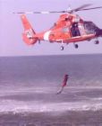 rescue swimmer - it's a guy jumping out of a chopper