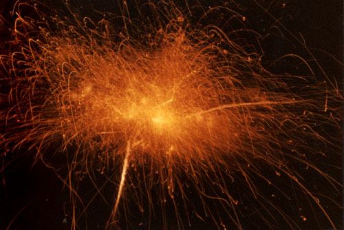fire crackers - a fire cracker bomb exploding shattering the peace of night