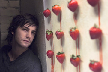 Strawberry Fields Forever - A scene from the movie where Jude gets mad at lucy for spending all her time trying to protest the war. She says he doesn't care. He gets frustrated because he too is upset that his friend and her brother is in vietnam but he shows it in different ways. In this scene he takes the strawberries from the still life he's trying to paint and uses them to create an american flag with strawberries on the wall which are dripping with juice. This is Meant to represent blood and the loss of life that is going on in vietnam.
