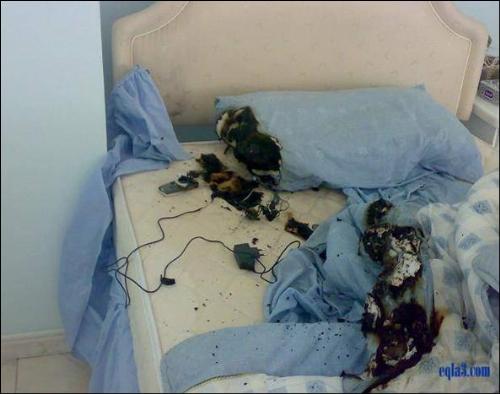 explosion of mobiles - this is a snap which shows a bedroom after an explosion of a mobile battery which was kept nearby , for recharging,and resulted in burning.