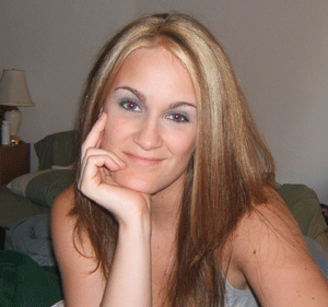 Me - This is a picture of me about a year ago. I had just did my highlights and was showing a friend back home. I've since cut 8 inches off my hair but its growing back now :)