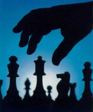 chess - an hand that moves a chess piece