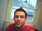 Me - Taken after too long on my computer - What the hell do thay want me to write here?! Okay this is me blah blah, hey do you like my shirt? Isn't they view out the window crap? - jeeeeez is that ok..?