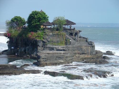 view in bali - this tanah lot , always remind me about bali , the temple or they usualy called pure , the beach , the wave , what a great place.