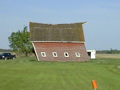 Very old buildings - Between White Fox and Nipawin Saskatchewan there is this old barn. It's still standing after all these years, although I frequently wonder how much longer it can possibly last. We frequently get harsh winds and I think this barn can tell you they are mostly from the south. Everytime I drive by I have to look to see if it has succumbed to the weather yet. I guess it is a tribute to the pioneers and their building skills. They certainly don't make things like they used to.